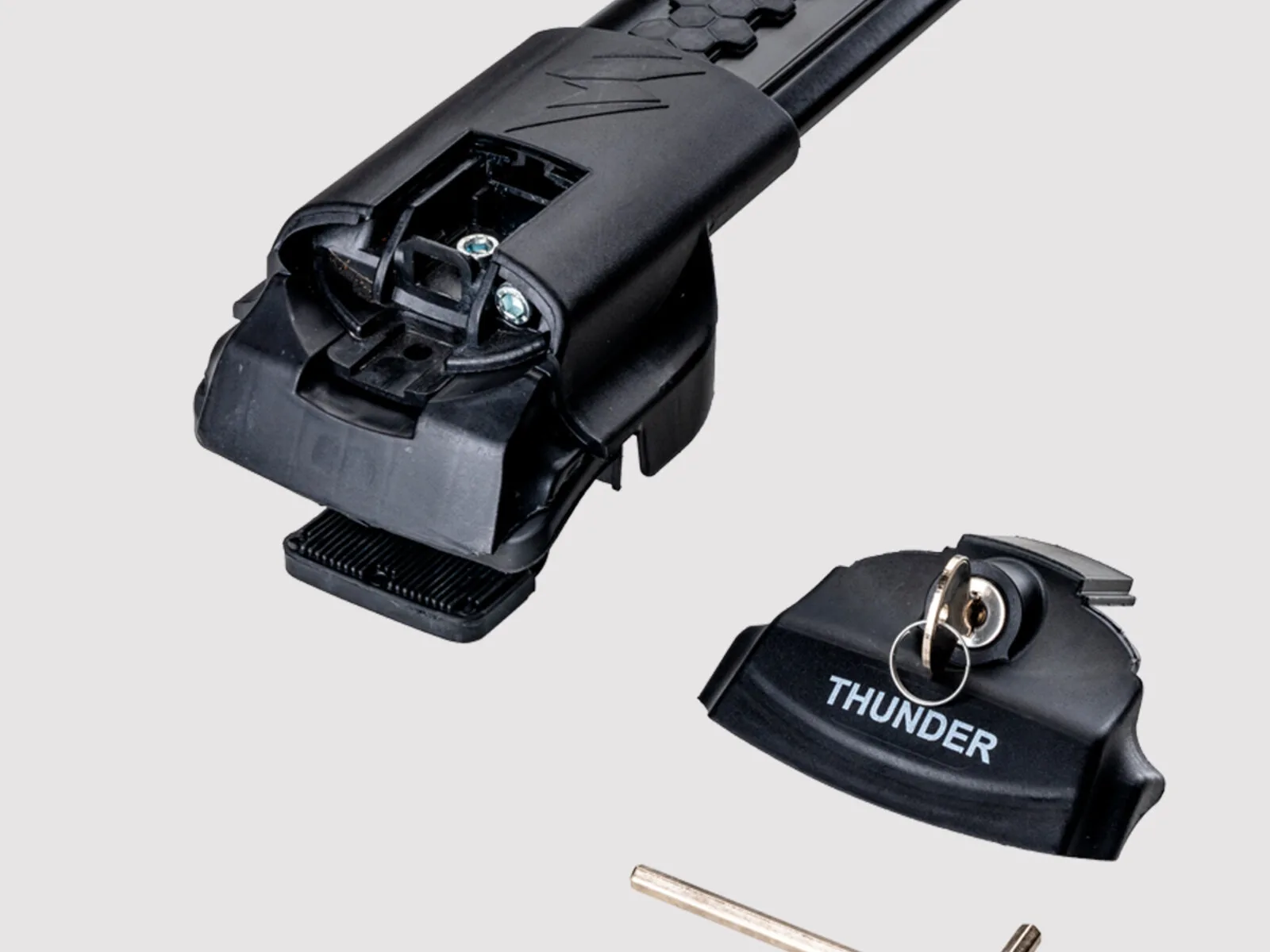 Thunder TRX1 en negro, vista de perfil sobre rieles elevados